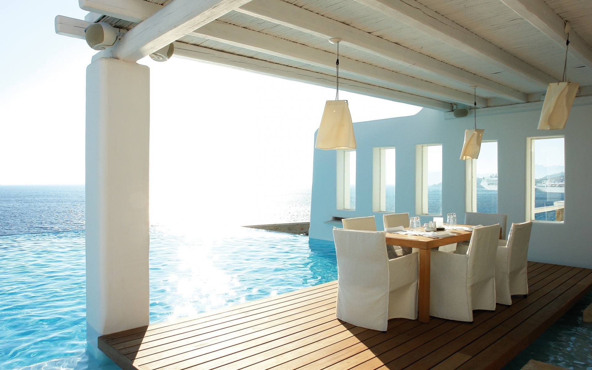 cadeira luxo hotel sofá resort móveis férias villa quarto interior janelas relaxamento verão oceano mesa piscina piscina mar terraço fundo