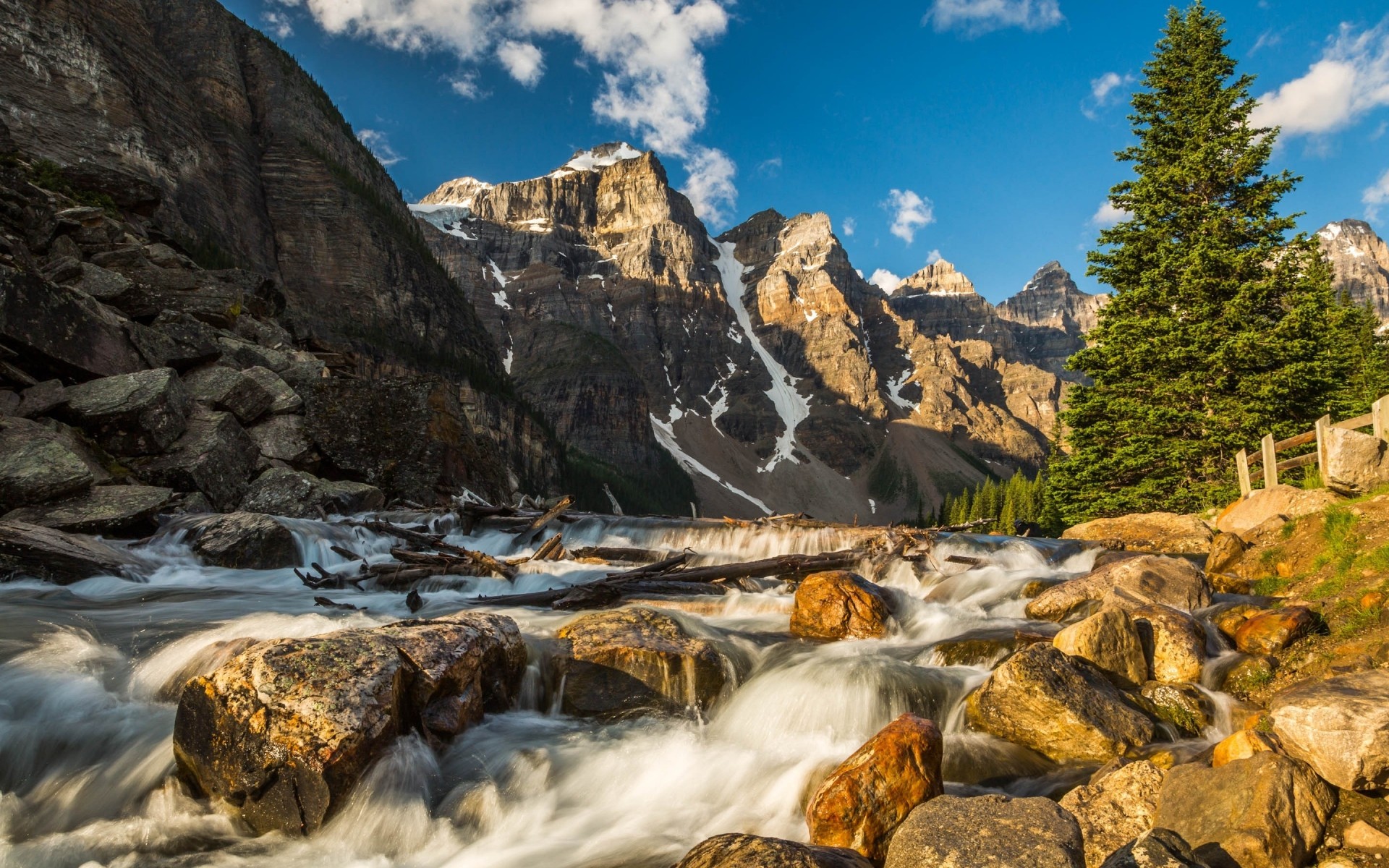 montanhas viagens rocha água ao ar livre paisagem natureza cênica neve céu vale luz do dia caminhada rio árvores céu azul nuvens