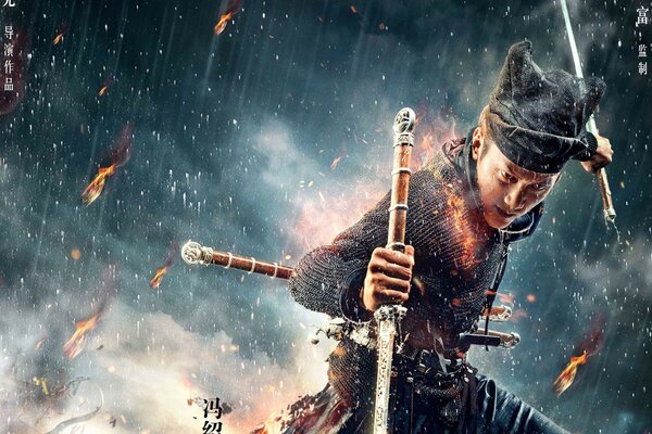 O homem com duas espadas na chuva
