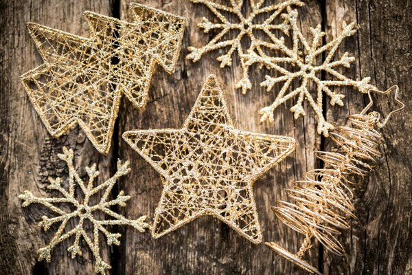 Pequenas decorações de Natal de ouro