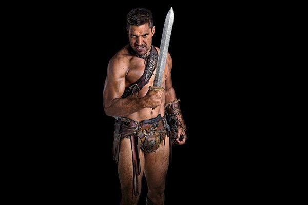 Stripper bombeado retrata um gladiador