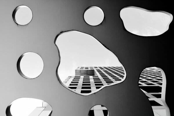 Reflexão do edifício em gotas de água