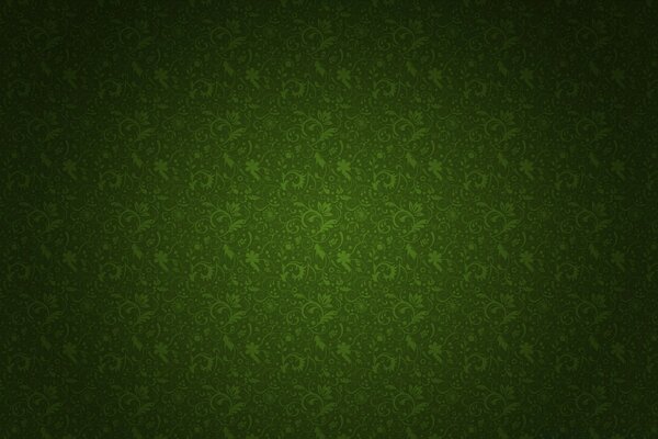 Parede verde com detalhes em forma de galhos