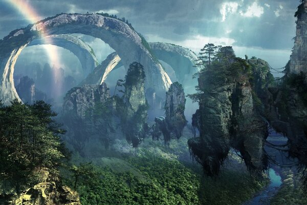 Rochas aéreas árvores e arco-íris