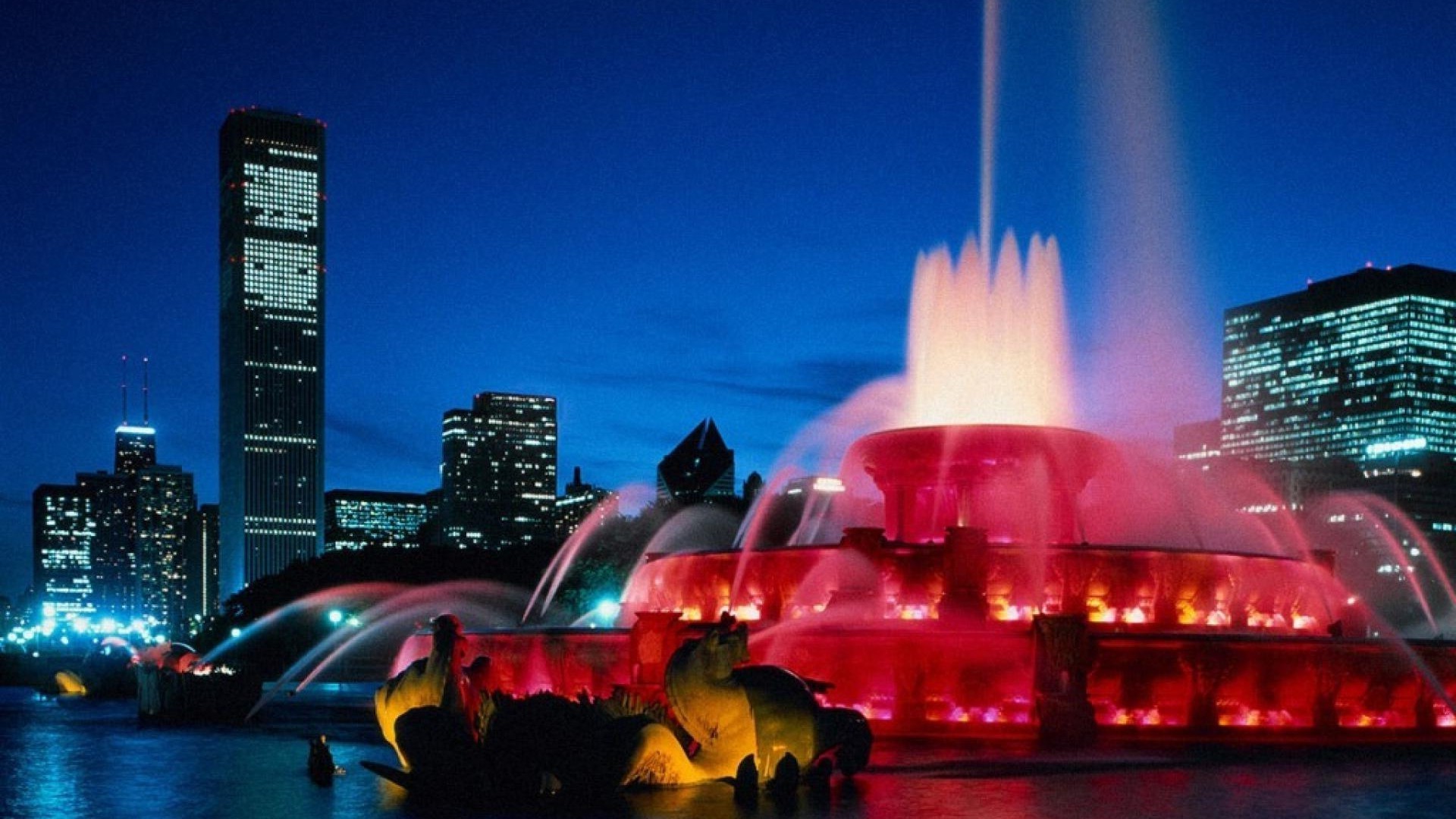 cidade centro da cidade arranha-céu cidade noite anoitecer viagens skyline arquitetura casa urbano luz rua pôr do sol ponte água reflexão iluminado rio céu