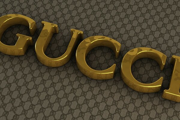 Gucci marca letras de ouro volumétricas