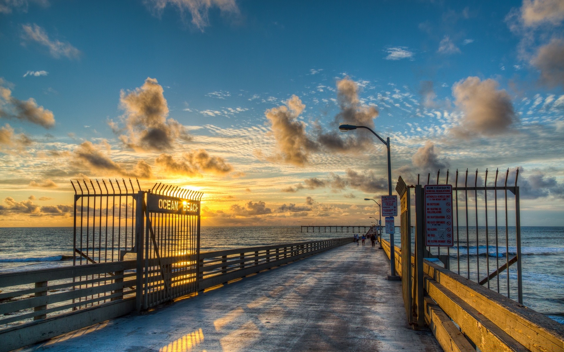 américa praia pôr do sol água mar amanhecer cais viagens oceano mar céu cerca ponte sol paisagem calçadão ao ar livre crepúsculo noite luz